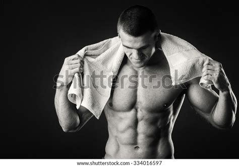 Bodybuilders Towel On Dark Background Demonstration Stock Photo