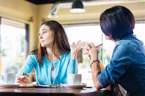 Check spelling or type a new query. Annoyed Teen Girl Talking To Mother In Coffee Shop Stock Photo - Download Image Now - iStock