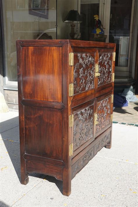 Mirror back, adjustable glass shelves with lights and. Chinese Carved Rosewood Cabinet at 1stDibs
