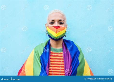 Young Lesbian Woman Wearing Rainbow Mask And Flag Lgbt Concept Stock Image Image Of Happy