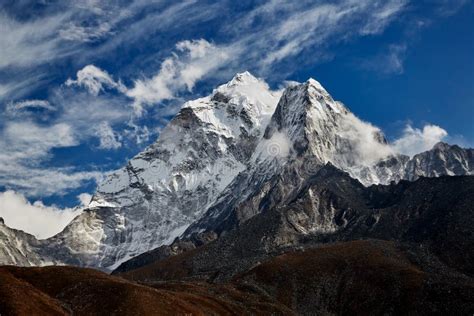 Himalayas Mountain Landscape Steep Snowy Peak Of Nuptse On A Beautiful