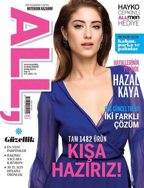 A Woman In A Blue Dress On The Cover Of A Magazine