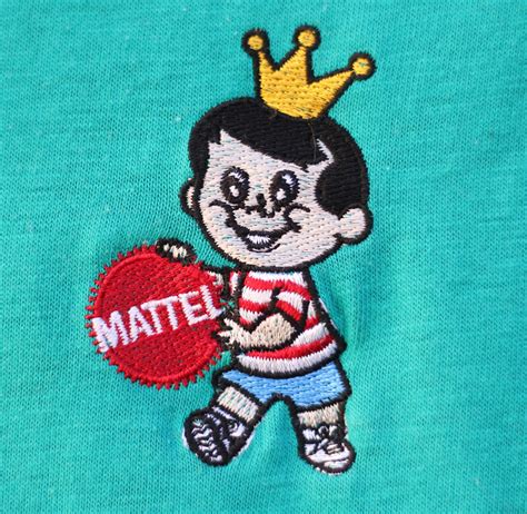 Extremadamente Raro 1970s Matty The Mattel Toys Mascot Mens Teal Polo