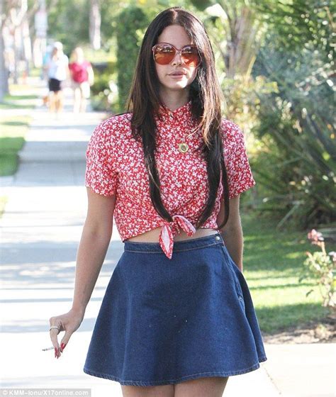 Lana Del Rey Goes With Full Retro Look As She Strolls About In Tiny Denim Skirt And Huge S