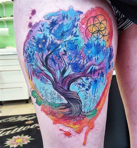 Palm tree tattoos are a very popular choice for those that seek a tree tattoo design. Colorful Tree of Life Tattoo On Womans Thigh | Best tattoo ...