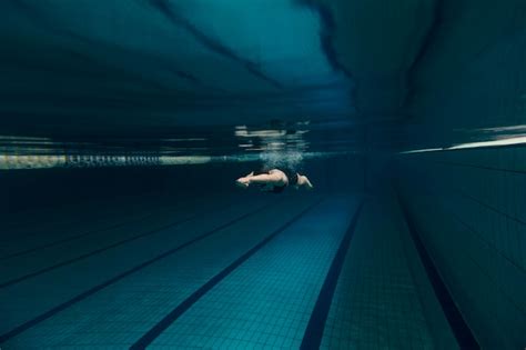 Premium Photo Long Shot Athlete Swimming Underwater