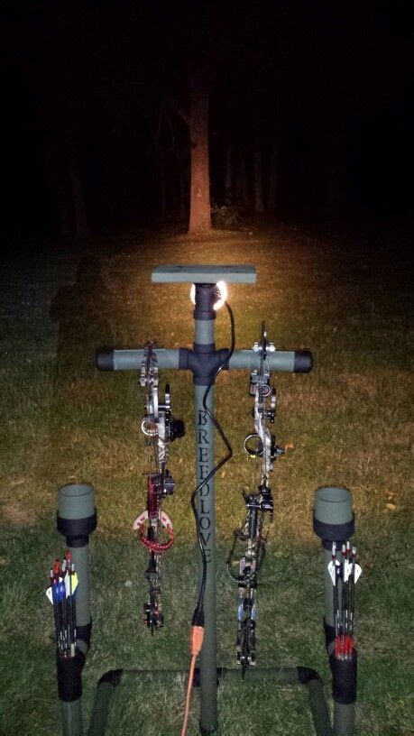 Pvc Bow Hanger With A Flood Light Cup Holder Arrow Holder And Table
