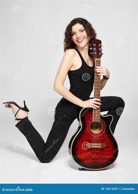 Curly Brunette With Guitar Stock Image Image Of Heels 12614307