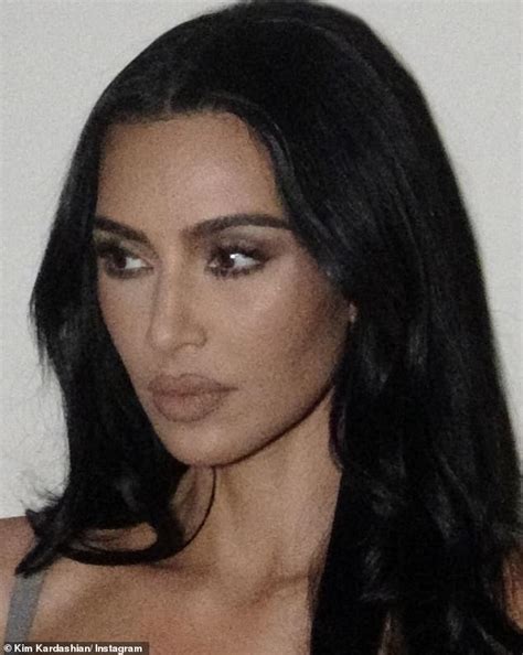 Kim Kardashian Leaves Little To The Imagination As She Rocks A Gray Bra In Behind The Scenes