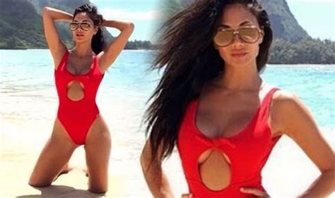 nicole scherzinger does her best baywatch impression in red boob baring swimsuit celebrity