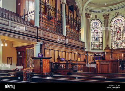 Saint Annes Church In Manchester Uk Side View Of Benches Organ And