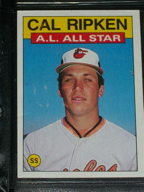 They (baseball cards) were beautiful and reassuring to behold, brand new and glistening crisply in their packages. Cal Ripken 1986 AL ALL-STAR BASEBALL CARD
