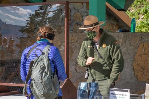 Ranger Helping Visitors At Logan Pass Visitor Center Flickr