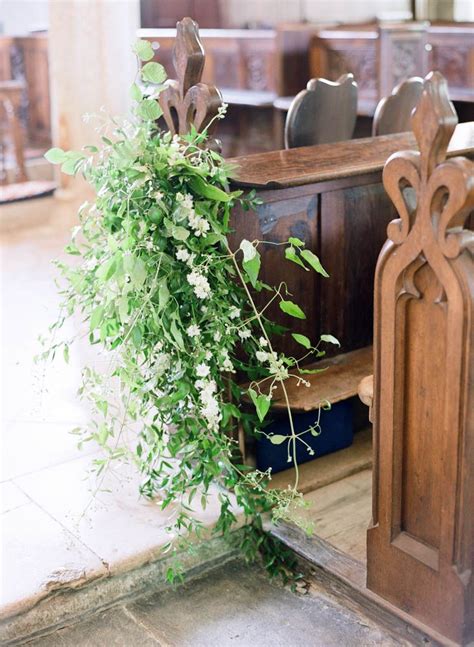 Foliage Pew End Inspiration With White Flowers Dotted Through Church