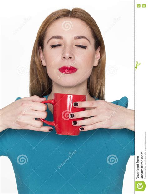 Young Pretty Woman Holding A Cup Of Tea Or Coffee Stock Photo Image