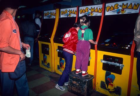 These games helped to earn video game makers and developers to earn billions during the early 80s. A collection of photos of 80s video arcades