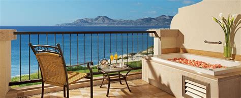 Due to social distancing and health guidelines, our pool, sauna, hot tub, and fitness centers will be closed until further notice. Secrets Los Cabos ocean front room with Jacuzzi tub on ...