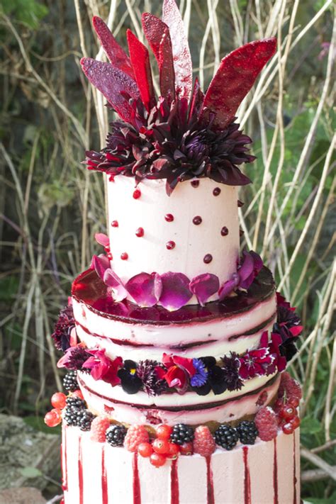 A Stunning Jewel Toned Wedding Cake With Edible Flowers Petals And Berries For A Rustic Autumn