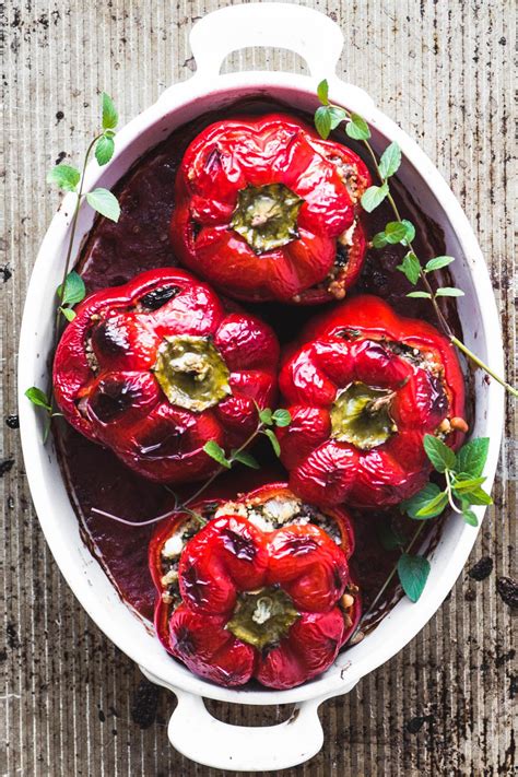 Coat a baking pan with cooking spray. Spiced Lamb and Couscous Stuffed Red Peppers in a ...