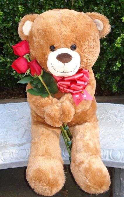 Or choose to pair a bouquet of flowers with a teddy bear or balloon, for a unique gift package. TEDDY BEAR WITH ROSES Large Teddy Bear holding Fresh Roses ...