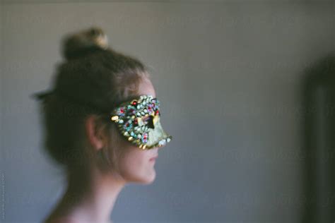 Side Profile Of Girl Wearing A Mask By Stocksy Contributor Jacqui