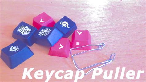 Three paperclips (ours measure 2 inches or 5cm out of the box). Make a Keycap Puller out of Paperclips - YouTube