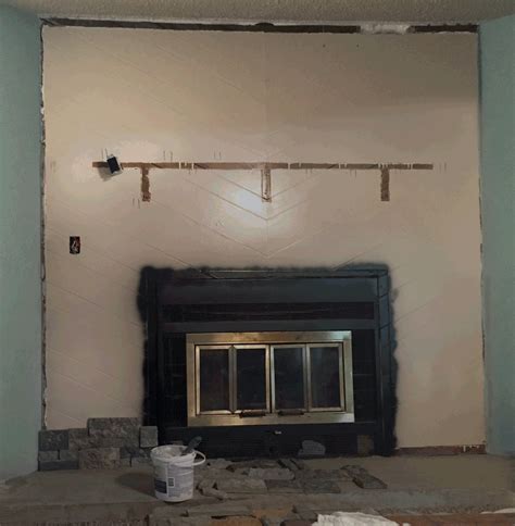 Linenfold panels were carved to imitate softly draped linen, and originate from the textile areas of. DIY chimney renovation: From painted wood paneling and ...