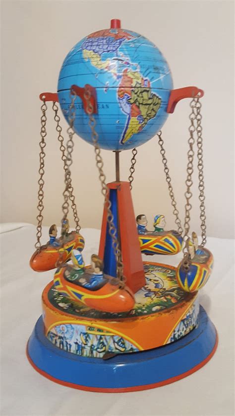 Tin Toy Carnival Rocket Ride Globe Carousel German Made By Etsy