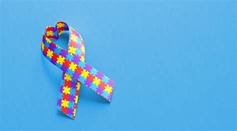 Autism colours autism background autism puzzle background faces puzzles autism mental spectrum autism puzzle piece autism vector world downs syndrome day autism awareness day. Heart Shaped Autism Awareness Ribbon On Blue Background ...