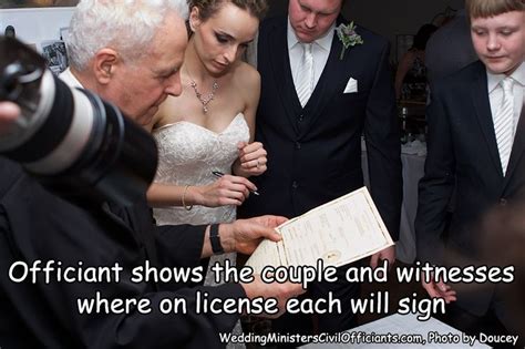 Officiant Shows The Couple And Witnesses Where On License Each Will Sign