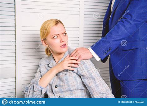 Businessman Sexually Harassing Female Colleague Person Putting Hand On