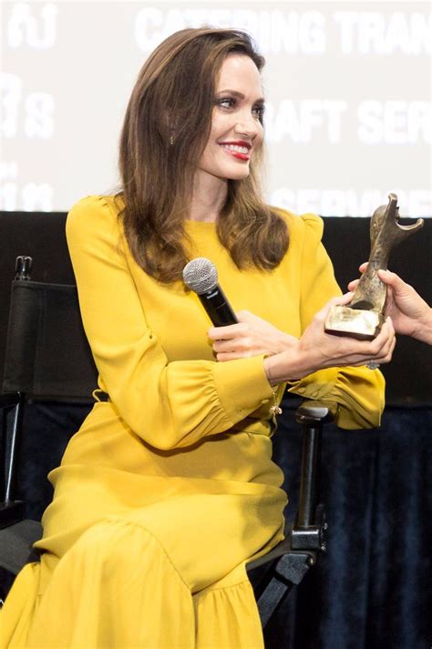 Angelina Jolies Magnificent Yellow Dress Just Might Stop You In Your
