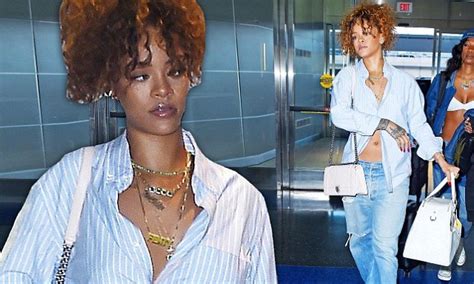 Rihanna Flashes Her Abs And Underwear As She Jets From New York To Lax