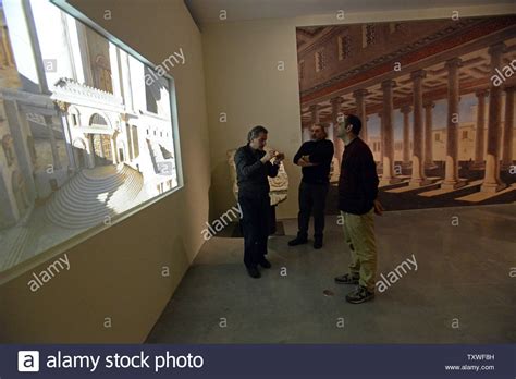 Visitors Watch A Multimedia Presentation Of The Temple Reconstructed By
