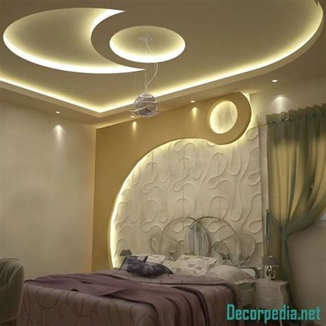 Keep the centre part in pop and surround it with wooden panels. pop design for bedroom, pop false ceiling design for ...