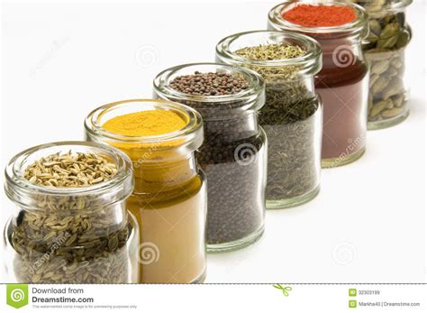 Herbs And Spices In Glass Jars Isolated On White