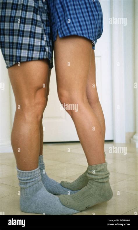 Legs Of Couple Kissing Stock Photo Alamy