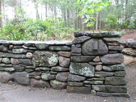 Atlantic specializes in natural field stone constructed walls, steps and veneers. New England fieldstone wall with battered pier and low ...