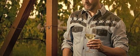 Premium Photo Cropped Oenologist Man Hold Wine Glass At Winery
