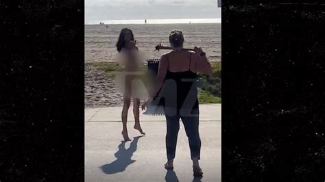 naked woman attacks venice beach visitor with spiked club on video mr mehra