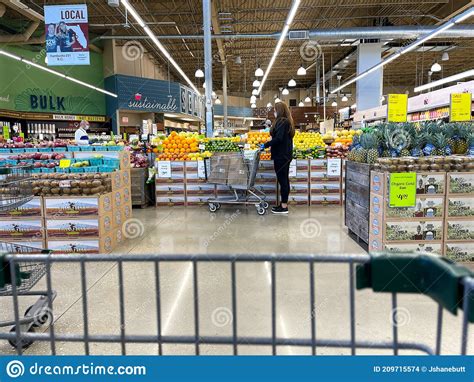 The Produce Aisle With A Cart Point Of View Of A Whole Foods Market