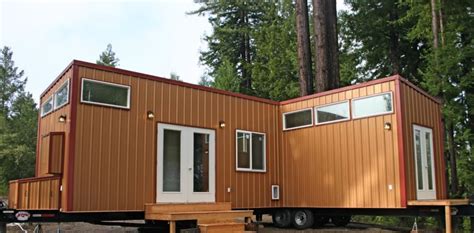 Two Tiny Houses On Wheels Joined Together