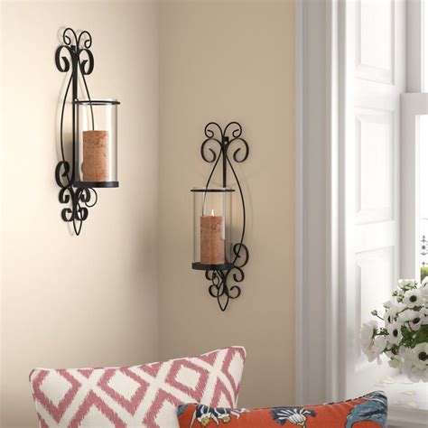 It features both traditional and old world design elements but also works well in more rustic environments. Tall Glass and Iron Wall Sconce | Iron wall sconces, Wall ...