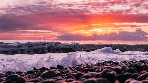 Download Wallpaper 2048x1152 Sunset Sea Waves Shore Pebbles