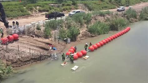 justice department tells texas that floating barrier on rio grande raises humanitarian concerns