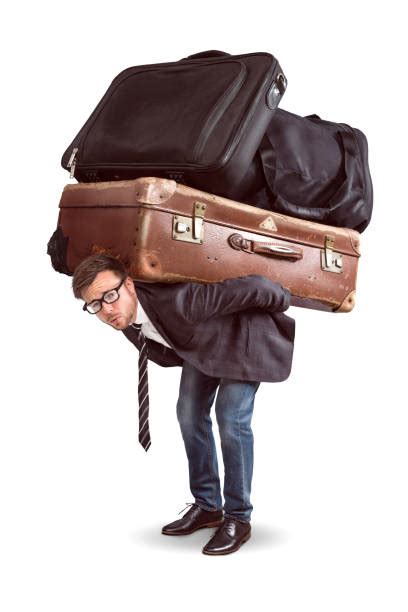 Man Carrying Luggage Stock Photos Pictures And Royalty Free Images Istock