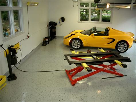 Hydraulic Car Lift Home Garage — Schmidt Gallery Design