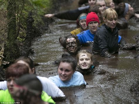 Runners Trawl Up To Their Necks In Mud For K Muddy Trials Daily