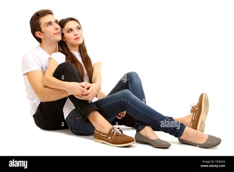 Loving Couple Sitting With Back To Each Other On Floor Isolated On