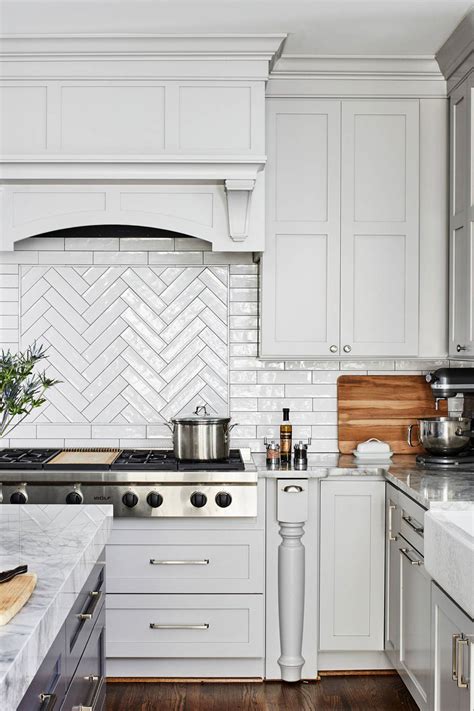 Reminiscent of fish scales, these tiles are neutral enough to go with any décor but unusual enough to not appear cliché. 50+ White Herringbone Backsplash ( Tile in Style ...
